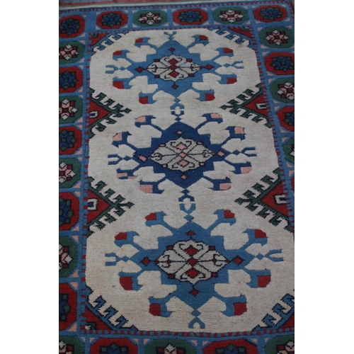 194 - VINTAGE EASTERN RUG
146 X 85CM