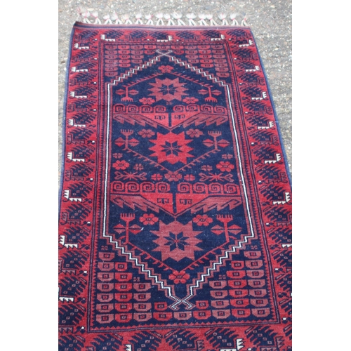 195 - VINTAGE EASTERN RUG
153 X 78CM