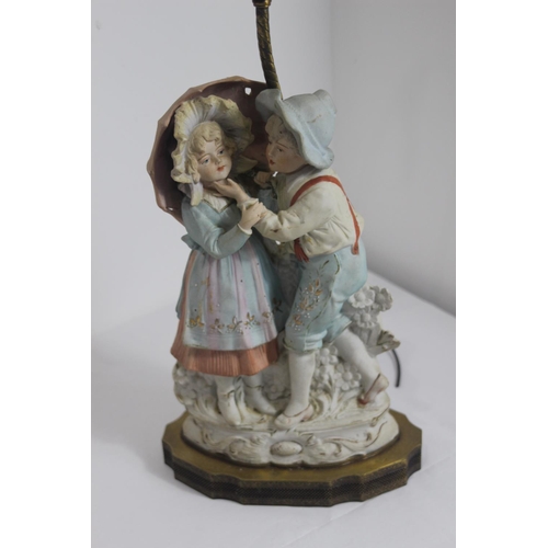 272 - ANTIQUE CERAMIC LAMP FOR BOY AND GIRL 
65CM