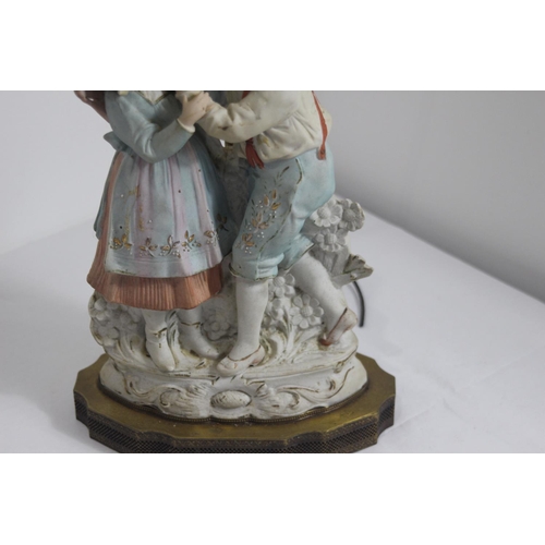 272 - ANTIQUE CERAMIC LAMP FOR BOY AND GIRL 
65CM