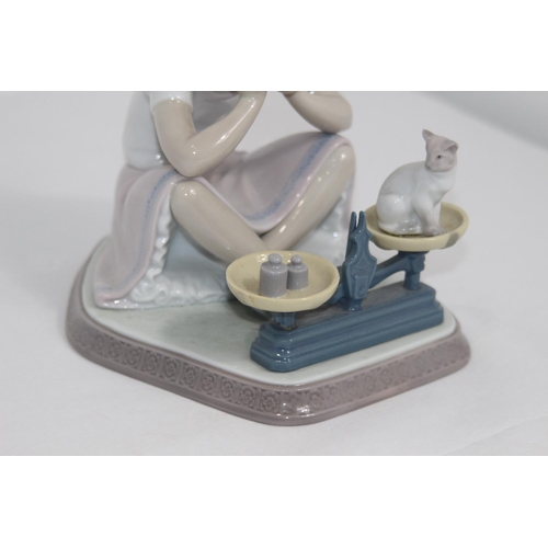 358 - LLADRO GIRL WITH KITTEN ON SCALES 
18CM