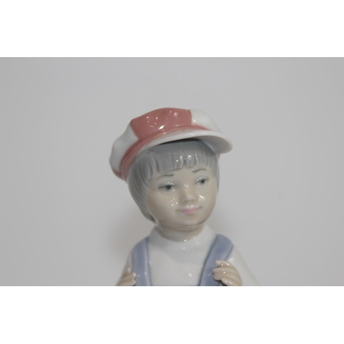 372 - LLADRO BOY IN DUNGAREES WITH HARMONICA
22CM