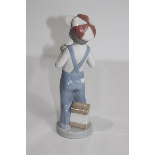 372 - LLADRO BOY IN DUNGAREES WITH HARMONICA
22CM