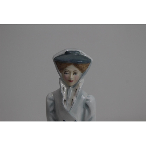 387 - ROYAL DOULTON SARAH IN WINTER FIGURINE
20CM