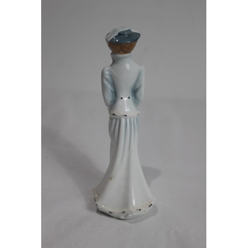 387 - ROYAL DOULTON SARAH IN WINTER FIGURINE
20CM