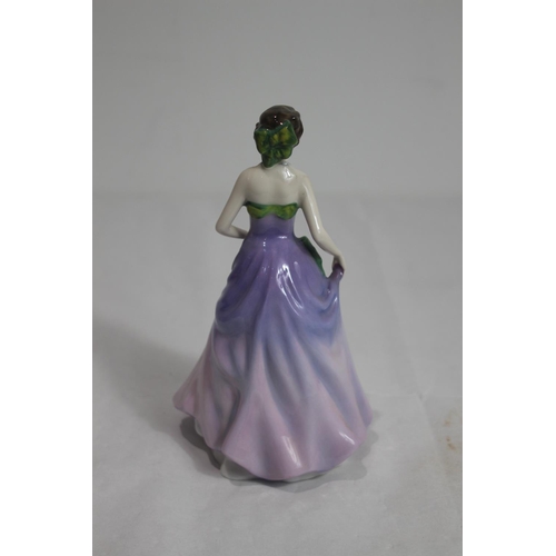 406 - ROYAL DOULTON FIGURE OF THE YEAR JESSICA 
20CM