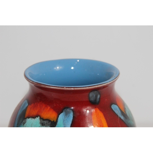 409 - POOLE POTTERY VASE IN VOLCANO PATTERN
17CM