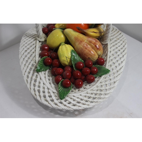 414 - LARGE PORCELAIN CENTRE PIECE BASKET OF FRUIT 
33 X 50CM