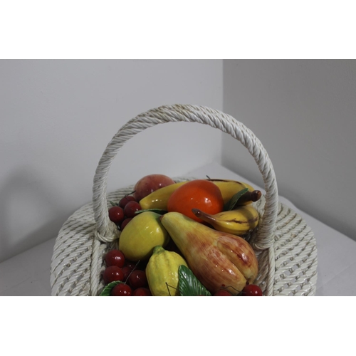 414 - LARGE PORCELAIN CENTRE PIECE BASKET OF FRUIT 
33 X 50CM