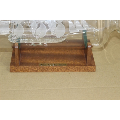 419 - THE CUTTY SARK GLASS SHIP IN A BOTTLE 
33CM