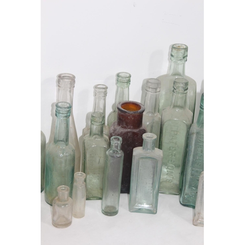 444 - QUANTITY OF VINTAGE GLASS BOTTLES
26CM