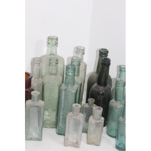 444 - QUANTITY OF VINTAGE GLASS BOTTLES
26CM