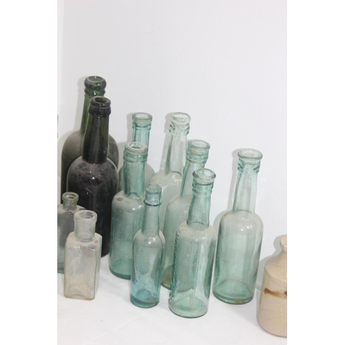 444 - QUANTITY OF VINTAGE GLASS BOTTLES
26CM