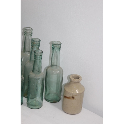 444 - QUANTITY OF VINTAGE GLASS BOTTLES
26CM