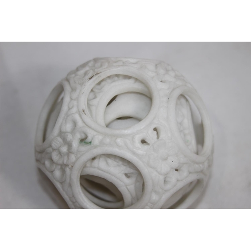 460 - PORCELAIN PUZZLE BALL 
12CM