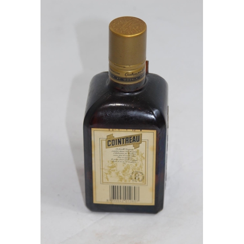 684 - SMALL BOTTLE OF COITREAU