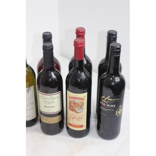 702 - 8 X BOTTLES OF ASSORTED WINE AND DRINK