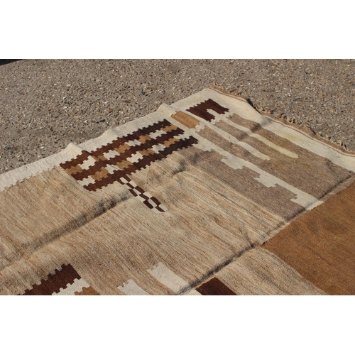 208 - ETHNIC WOVEN RUG - NEEDS A CLEAN HAS A SMELL 
300 X 200CM