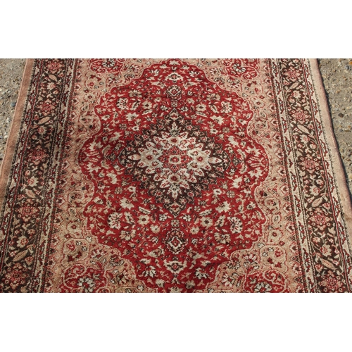 210 - VINTAGE MARKS AND SPENCERS RUG
127 X 95CM