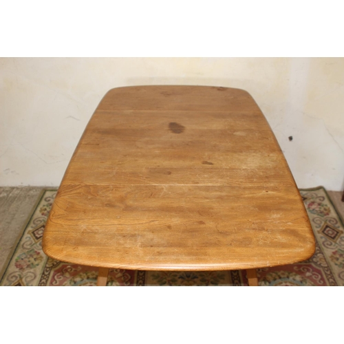 24 - BLONDE ERCOL DROP LEAF PLANK TOPPED TABLE 
137 X 74 X 71CM