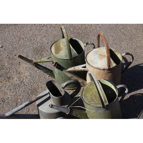 104 - QUANTITY OF 6 GALVANISED WATERING CANS ETC