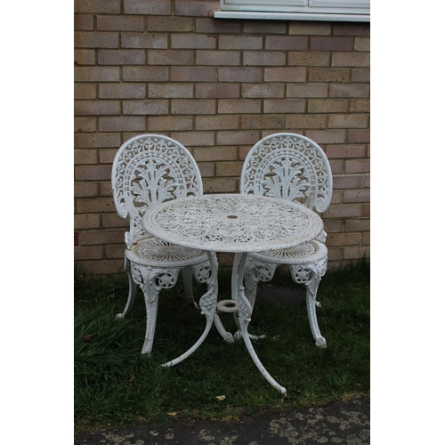 128 - METAL TABLE AND TWO CHAIRS 
70 X 65CM