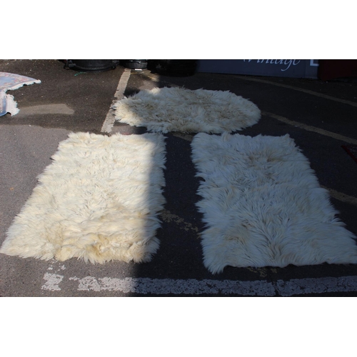 212 - 3 X SHEEP SKIN RUGS 
160 X 80CM