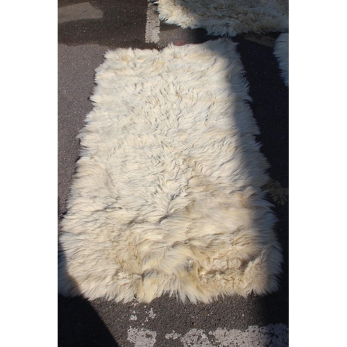 212 - 3 X SHEEP SKIN RUGS 
160 X 80CM