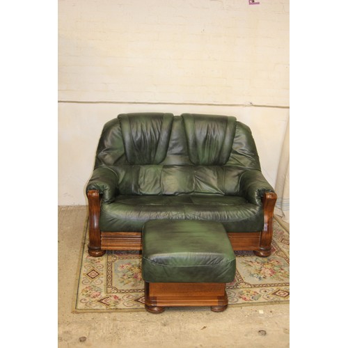 27 - GREEN LEATHER AND WOOD SOFA AND STOOL