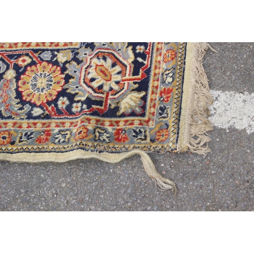 219 - VINTAGE RUG
334 X 250CM