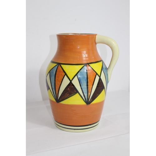 260 - JUG IN THE MANNER OF CLARICE CLIFF 
27CM