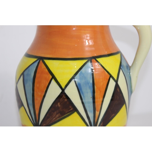 260 - JUG IN THE MANNER OF CLARICE CLIFF 
27CM