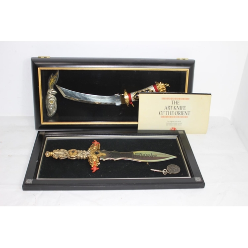 355 - 2 X FRAMED ORIENTAL DAGGERS 
54CM