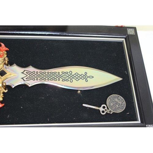 355 - 2 X FRAMED ORIENTAL DAGGERS 
54CM