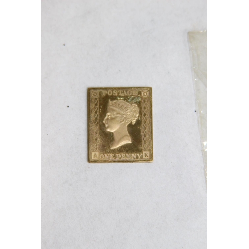 1017 - 9CT GOLD STAMP - 7G