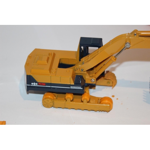 270 - KOMATSU TOMY DANDY DK-001 PC200 EXCAVATOR BAGGER DIE-CAST MODEL WITH BOX - A/F ON THE TRACKS