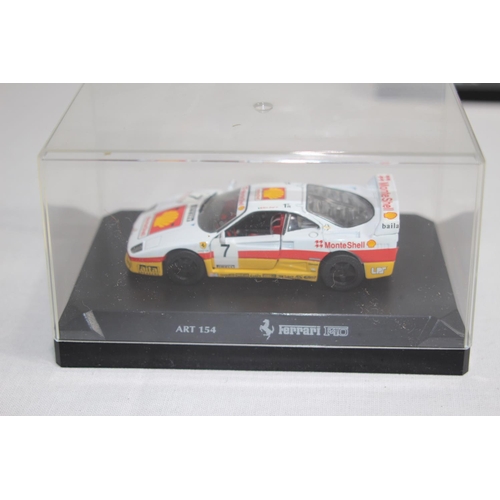 370 - 3 X RACING CARS IN DISPLAY BOXES 
JAG - FERRARI AND NISSAN