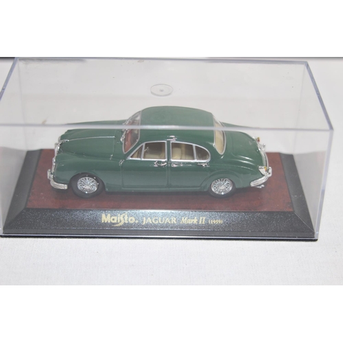 371 - 4 X VINTAGE CARS IN DISPLAY BOXES