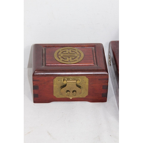 596 - QUANTITY OF CARVED WOODEN BOXES 
23 CM