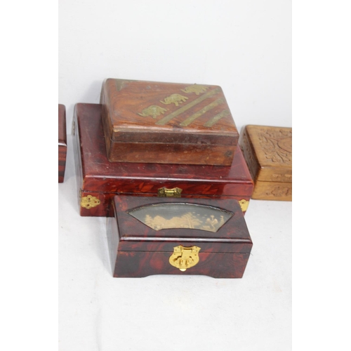 596 - QUANTITY OF CARVED WOODEN BOXES 
23 CM