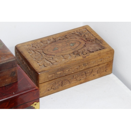 596 - QUANTITY OF CARVED WOODEN BOXES 
23 CM