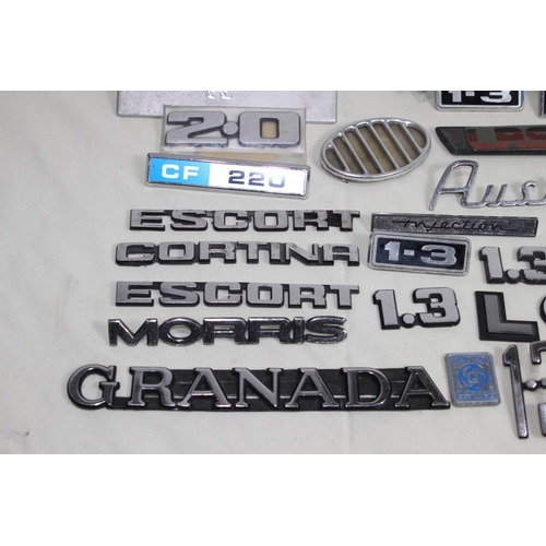 616 - QUANTITY OF CAR BADGES AND INSIGNIA