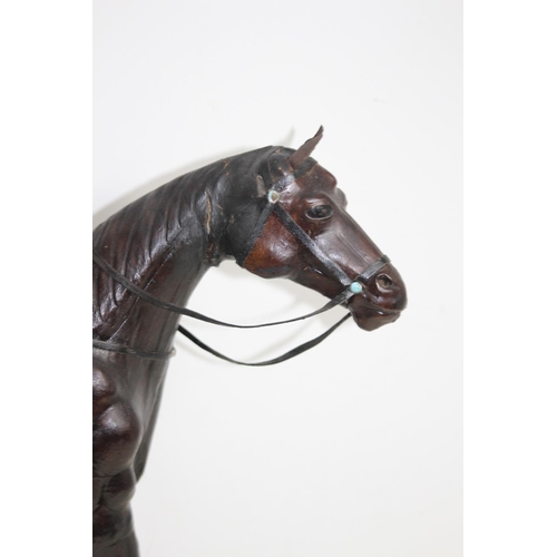 632 - VINTAGE LEATHER HORSE 
52CM X 49CM