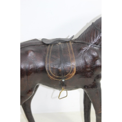 632 - VINTAGE LEATHER HORSE 
52CM X 49CM