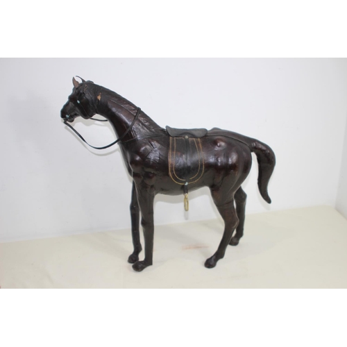 632 - VINTAGE LEATHER HORSE 
52CM X 49CM