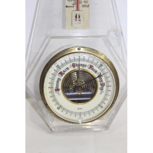 642 - PERSPEX BAROMETER 
29CM