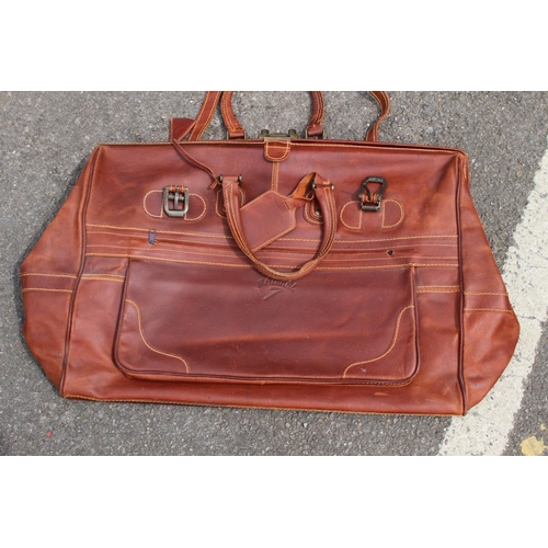 691 - 2 X LEATHER HOLDALLS