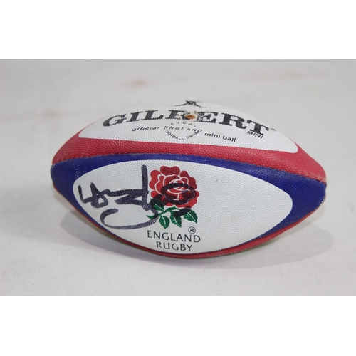 694 - SIGNED GILBERT RUGBY BALL BY LAWRENCE DALLAGLIO 
16CM