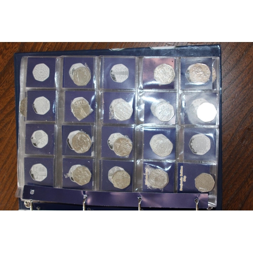 988 - CHANGE CHECKER COIN FOLDER WITH OVER £100 OF 50P, £1 AND £2 COINS