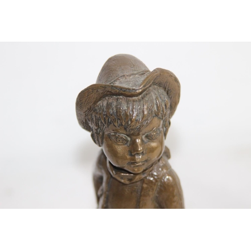 793 - COPPERISED FIGURE OF A CHILD DRESSED AS  COWBOY
23CM